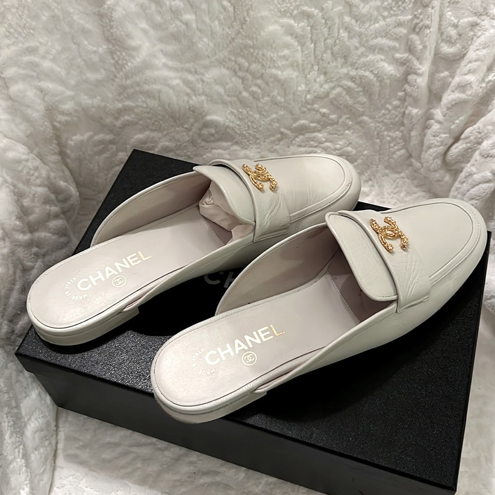 CHANEL White Mules with Gold Accent